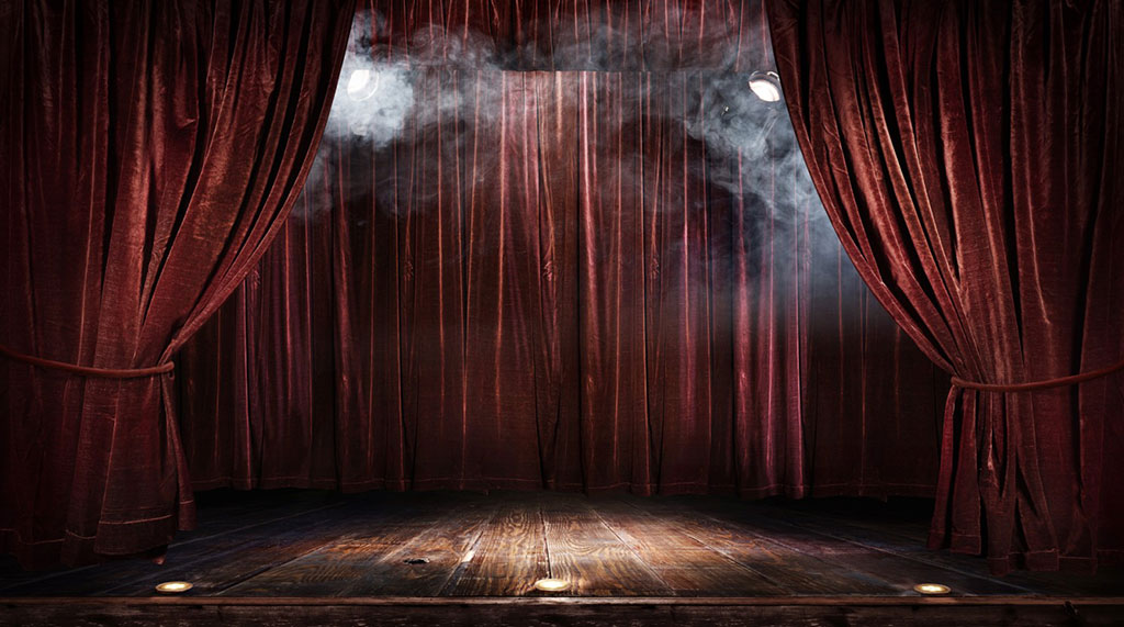 Theater curtains, lighting, and smoke