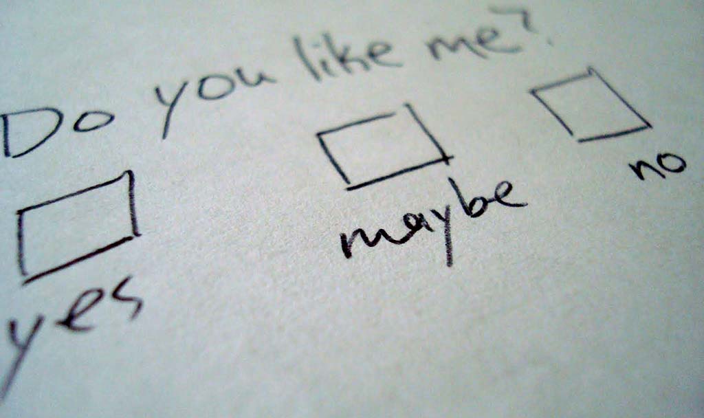Hand-written note asking Do you like me? Has options for yes, no, maybe.