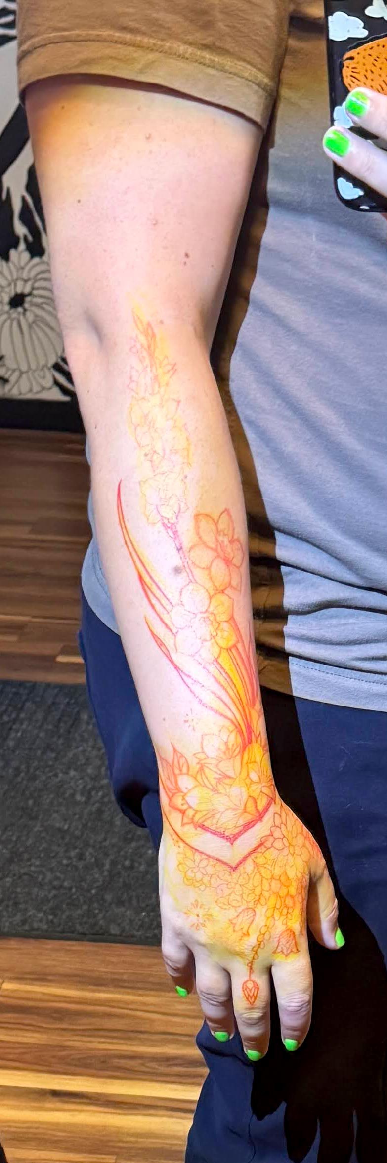 Corry's forearm tattoo progress photo of sharpie marker sketch from the side