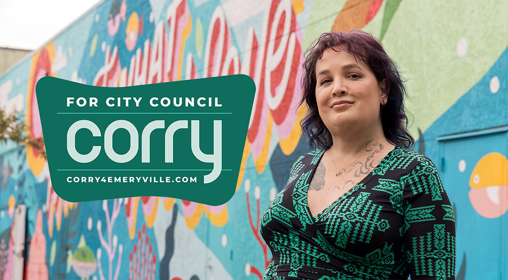 Corry Frydlewicz stands in front of Emeryville's Protect What You Love mural. Her city council campaign logo alongside
