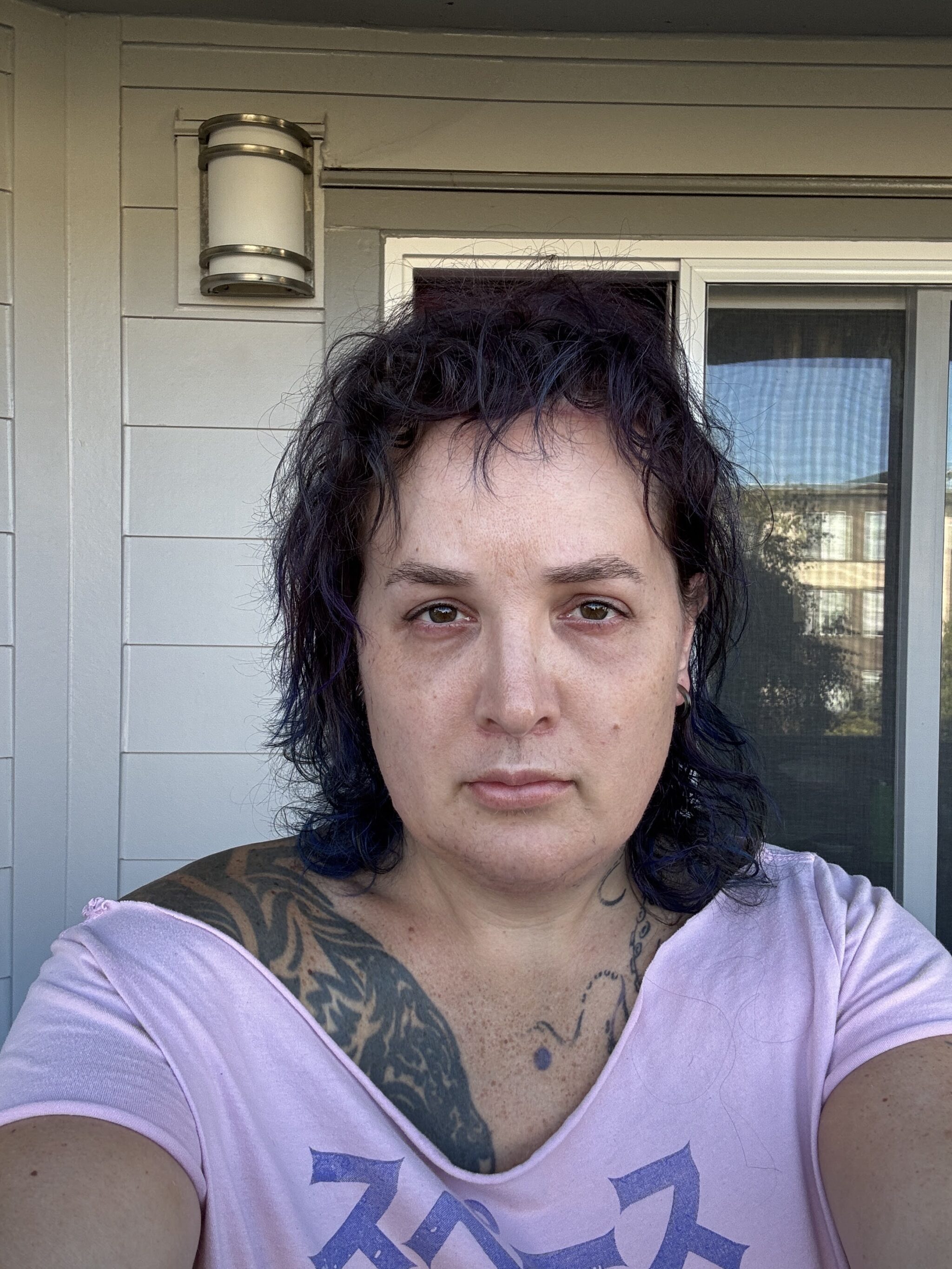 Corry Frydlewicz selfie 9/30/2026 with a neutral face and no makeup -- front view